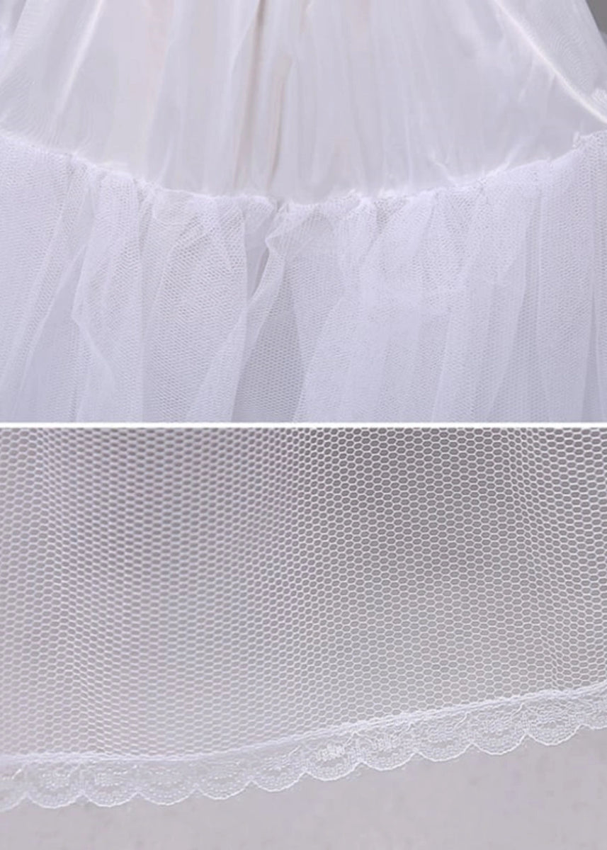 Timeless Black and White Petticoats Elevate Prom Dress Silhouettes - White - PromDressClub